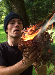 Bushcraft Survival Expert Showing a stag party how to light fire