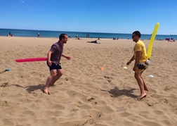 Stag party playing beach games in Valencia