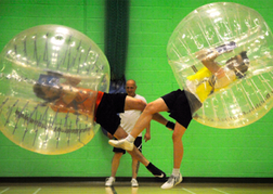 stag party playing bubble football & Smashing together
