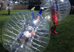 stag party playing Bubble Football one man rolling over