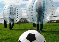 Bubble Football Leeds close up of football with zorbs behind