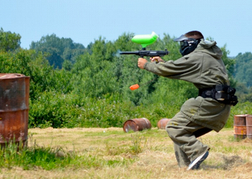 Paintball man in action