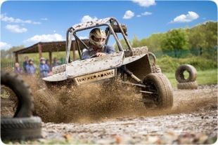 A Rebel Buggy or Dirt Buggy kicking up dirt