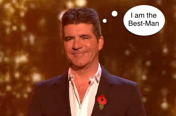 Simon Cowell on the X Factor Stage stating thinking bubble saying I am the best man