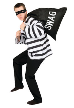 Man in fancy dress costume dressed like an old style burglar