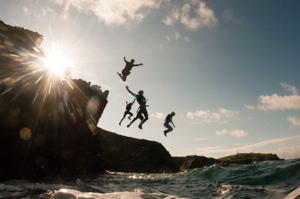 Stag Group Jumping Off Cliff