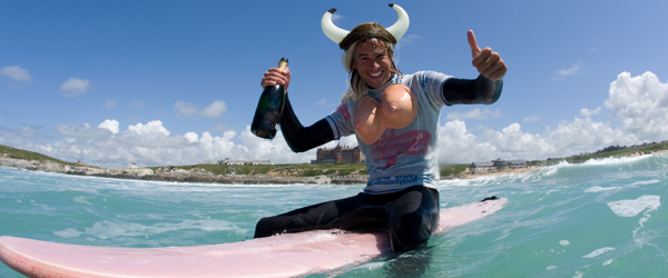 Stag Sat On Surf Board In The Sea 