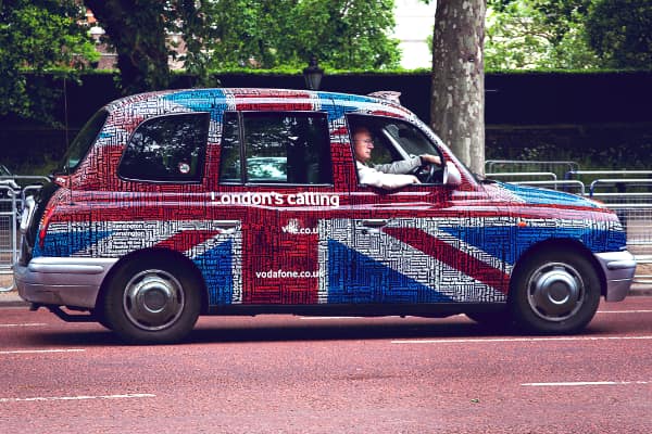 London Cab in the Union Jack on Pall Mall