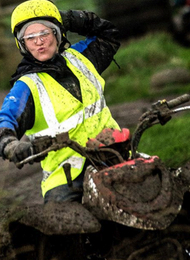 Lady From A Hen Party Wearing Hi Vis and Riding a Quad Bike in Bristol