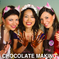 Group of Women with Chocolate on their Hands
