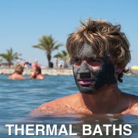 Man with mud on his face at the thermal baths 