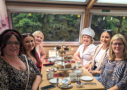 Hen party enjoying afternoon tea at sea