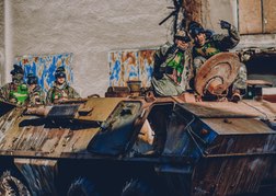 Group Sat In Armoured Tank