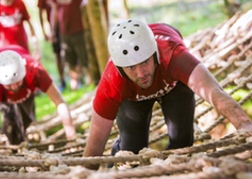 Man From A Stag Party taking part in an Assault Course