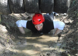  Man From A Stag Party taking part in an Assault Course Cardiff 