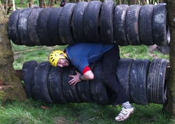 Man From A Stag Party taking part in an Assault Course Cardiff 