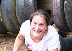  Lady From A Hen Party taking part in an Assault Course