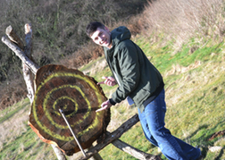 Man From a Stag Party Taking His Axe Out Of A target