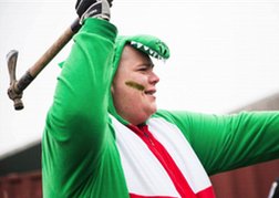 Man From a Stag Party Axe Throwing in Fancy Dress