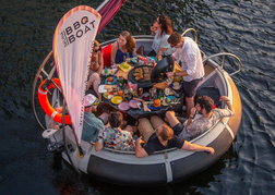 Group enjoying a BBQ boat on the River Thames
