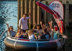 Group enjoying a BBQ boat on the River Thames