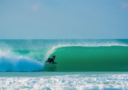 Bodyboarder in sea in Newquay