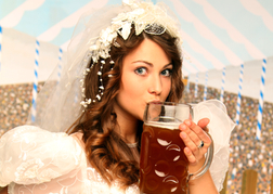 Bride Drinking a Stein of Lager on a hen weekend