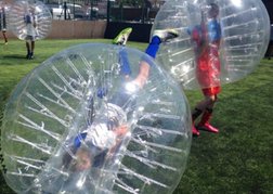 group playing Bubble Football whilst on a stag weekend