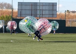 group playing Bubble Football in Valencia on a stag weekend