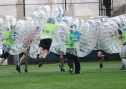 massive stag party playing Bubble Football