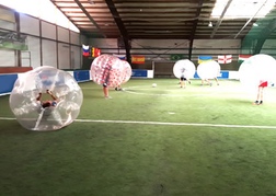 Indoor bubble football pitch with a stag party in Hamburg