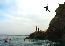 Man In Mid Air Whilst Coasteering