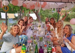 Hen party group enjoying cocktail making at their own venue