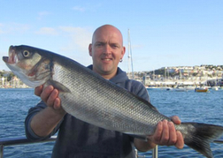 Man with Large Fish