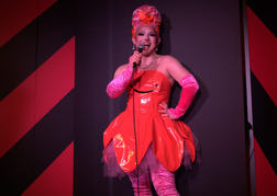 Drag queen performing on stage at Hootenannies Edinburgh