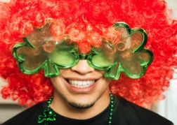 man in wig wearing glasses