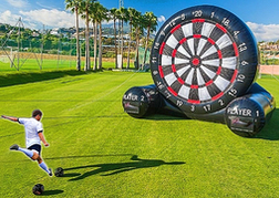 Man playing foot darts