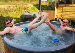 Two stags striking a pose in hot tub 