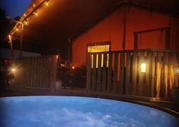 Safari Lodge Camping Hot Tub Nightime Bournemouth