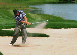 Golf Shot Out Of The Bunker