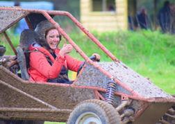 Hen giving a thumbs up in a Rage buggy