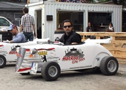 Stag sitting in a Hot Rod in Germany