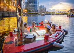 Stags enjoying a hot tub boat in London