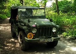 Military vehicle in woodland