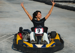 Lady winning a kart race