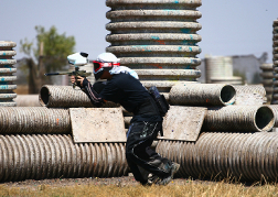 Paintball man in action