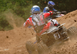 Quad Bike Racing Kicking Up Dust