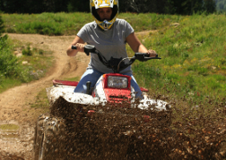 Quad Biking Going Through the Mud