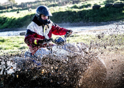 Quad Biking Through Mud