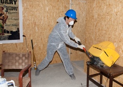 Man destroying a screen whilst doing the Rage Room Smash Berlin